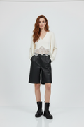 13 – Cardigan, hands in pockets