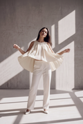 Arms out fabric flowing