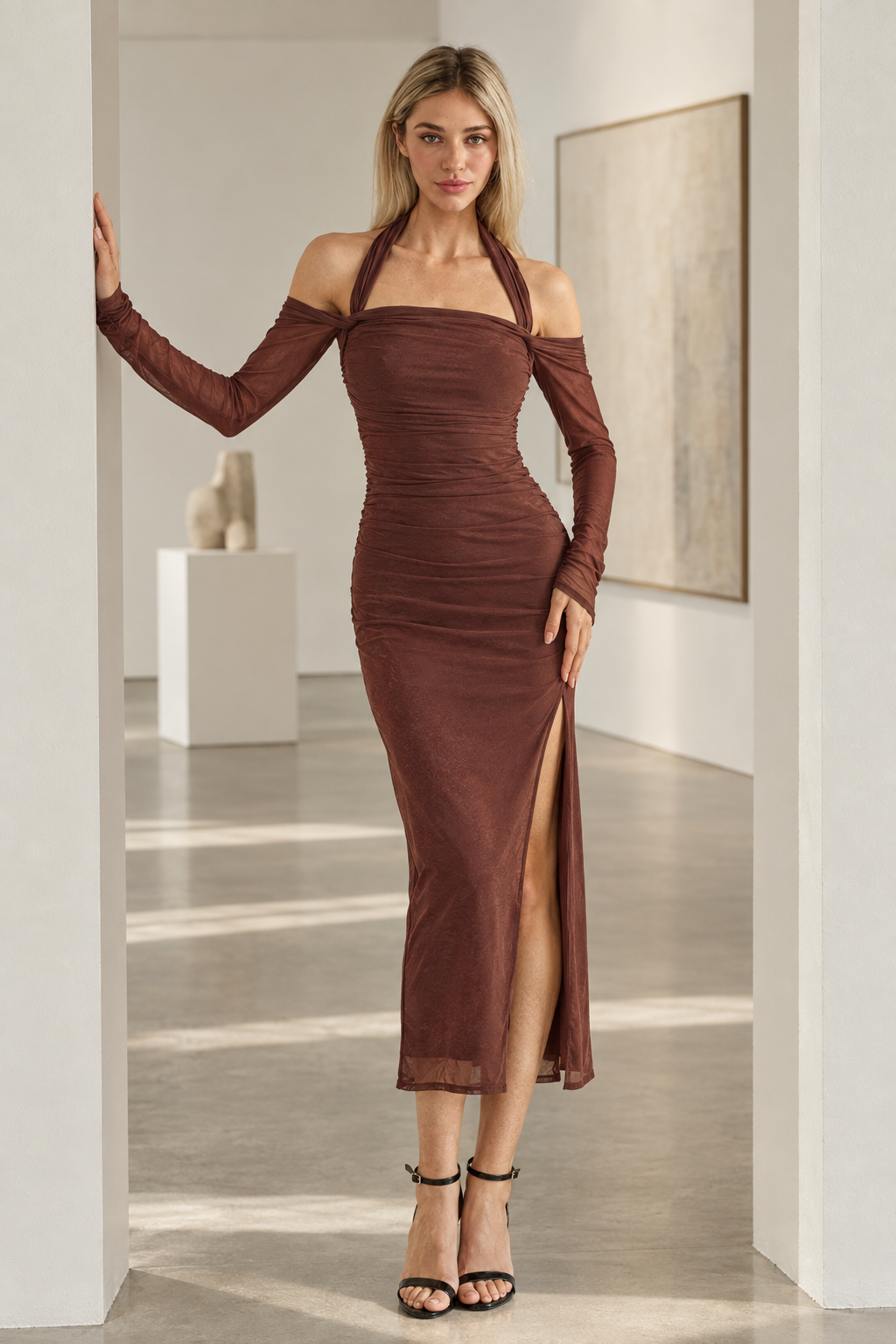 Caminia dress editorial, full-body gallery doorway pose