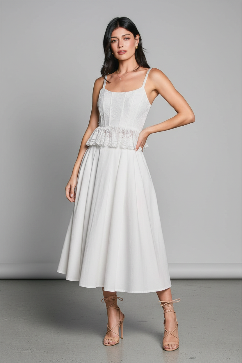 Close-up – collarbone to mid-thigh, hand on peplum