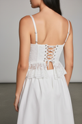 Close-up – lower corset, bow & lace peplum ruffle