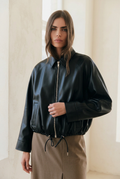 Cuff-focused jacket portrait