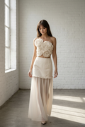Fleur Rosette — Hand on Bustier