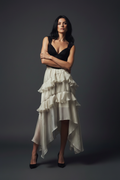 Full body – arms crossed, leaning
