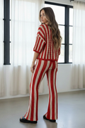 Full body back view, glancing over shoulder