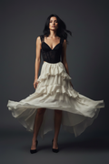 Full body – dynamic mid-turn, skirt fanning