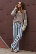 Full-body wall-leaning pose