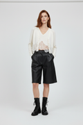 Ivory 7 – Cardigan, hands in pockets