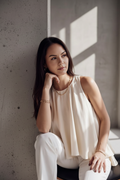 Leaning against wall