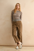 Leaning against wall