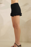 Side silhouette, waist to knee