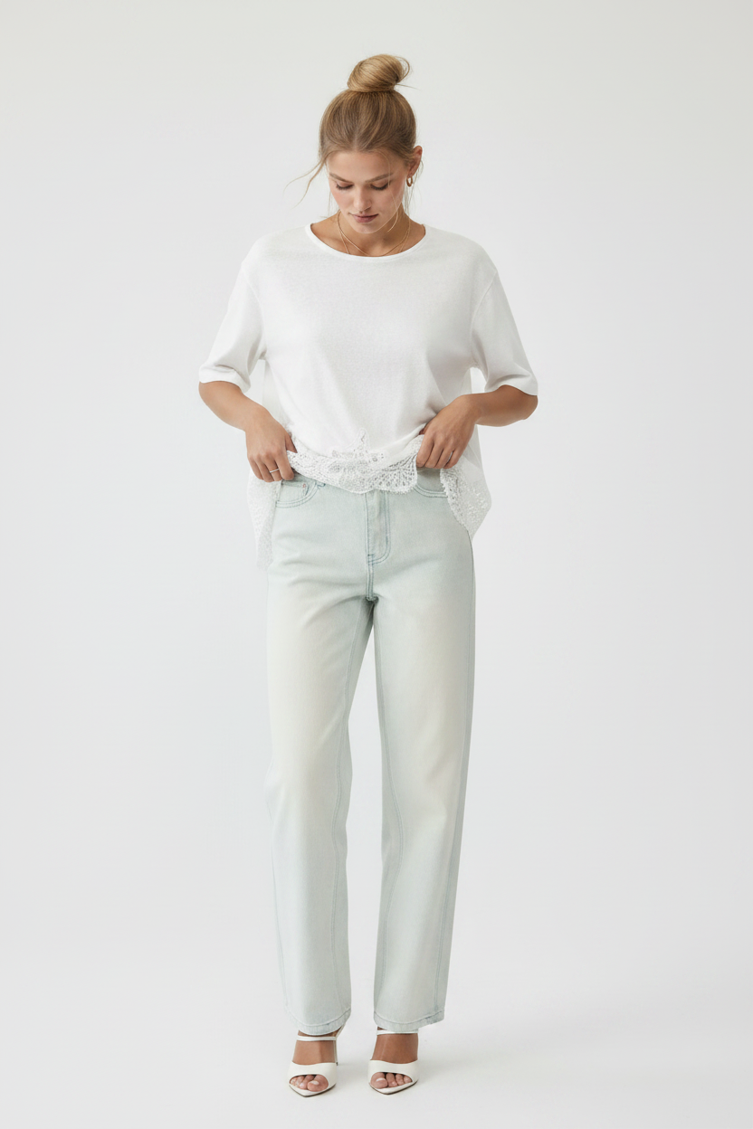 Touching lace hem, hand on hip